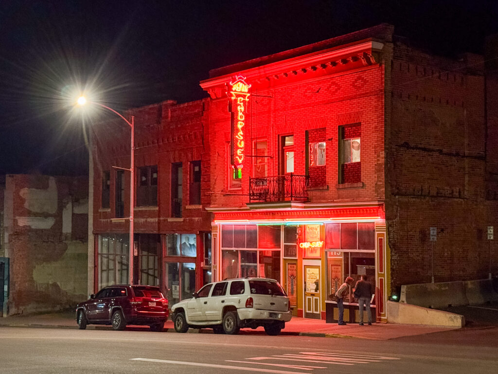 The Pekin Noodle Parlor neon glows at night in Uptowm Butte, Montana.