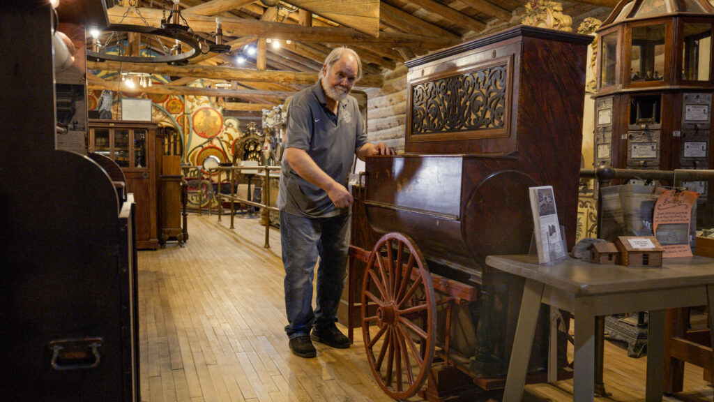 Michael Edwards cranking the Barrel Piano in the Nevada City Museum