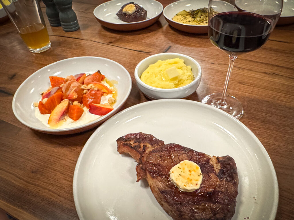 A picture of a steak dinner of sustainably sourced local Montana beef at The Union Butcher Shop & Wood Fired Grill, run by the Old Salt Co-Op in Helena, Montana.