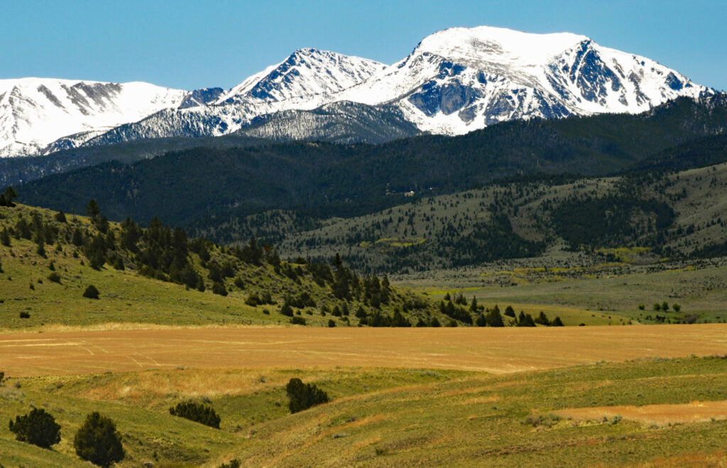 Scenic landscape photo of beautiful mountains in Southwest Montana near Harrison, Montana. Photo of Hollow Top Mountain in the Tobbacco Root Mountain Range.