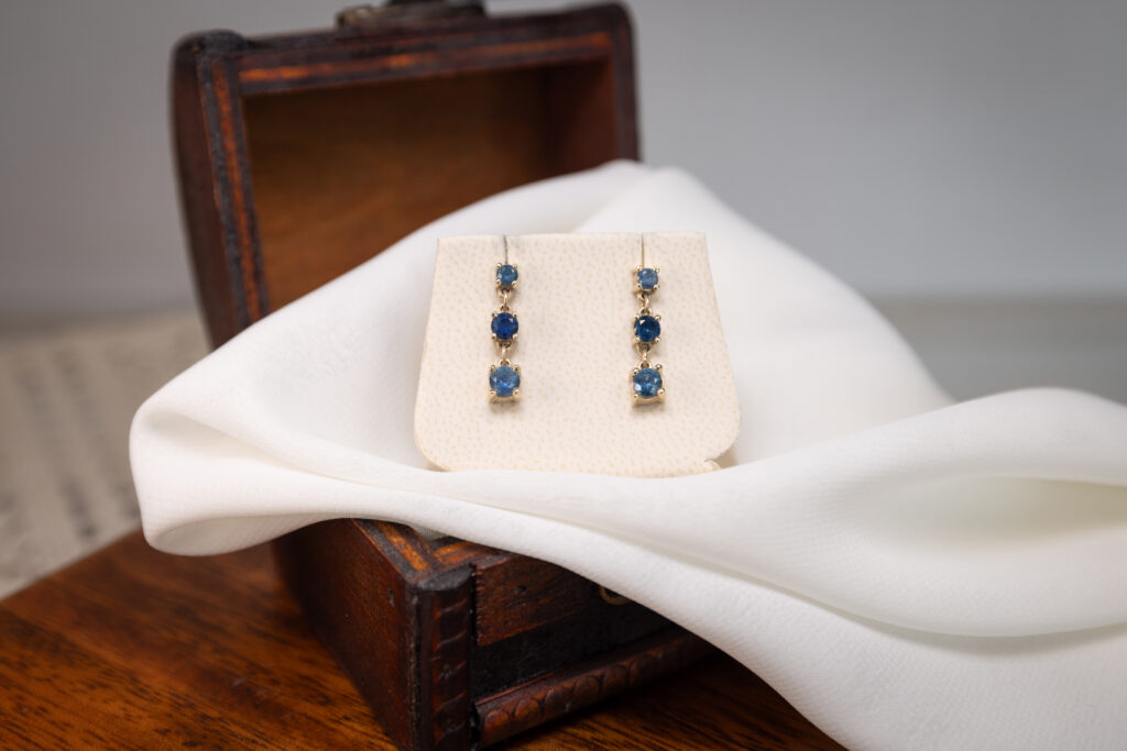 Montana Sapphire earrings for sale at Gem Mountain in Philipsburg, Montana. Photo by Sarah Bolt, Tempest Technologies.